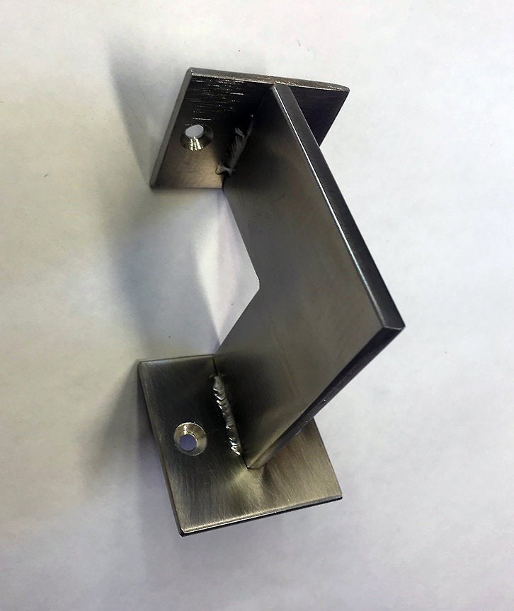 Can a Handcrafted Metal Wall Bracket Enhance Your Portland Home's Shelving Design?